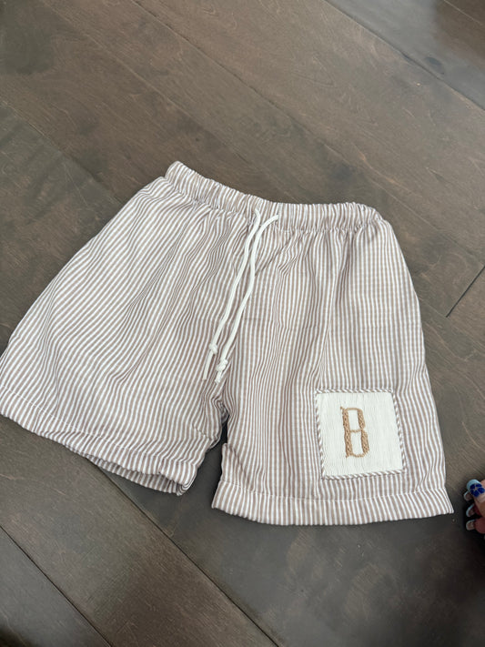 Tan Smocked Swim Trunks